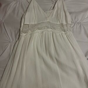 Elegant Cream Sleeveless Dress with Lace Detail